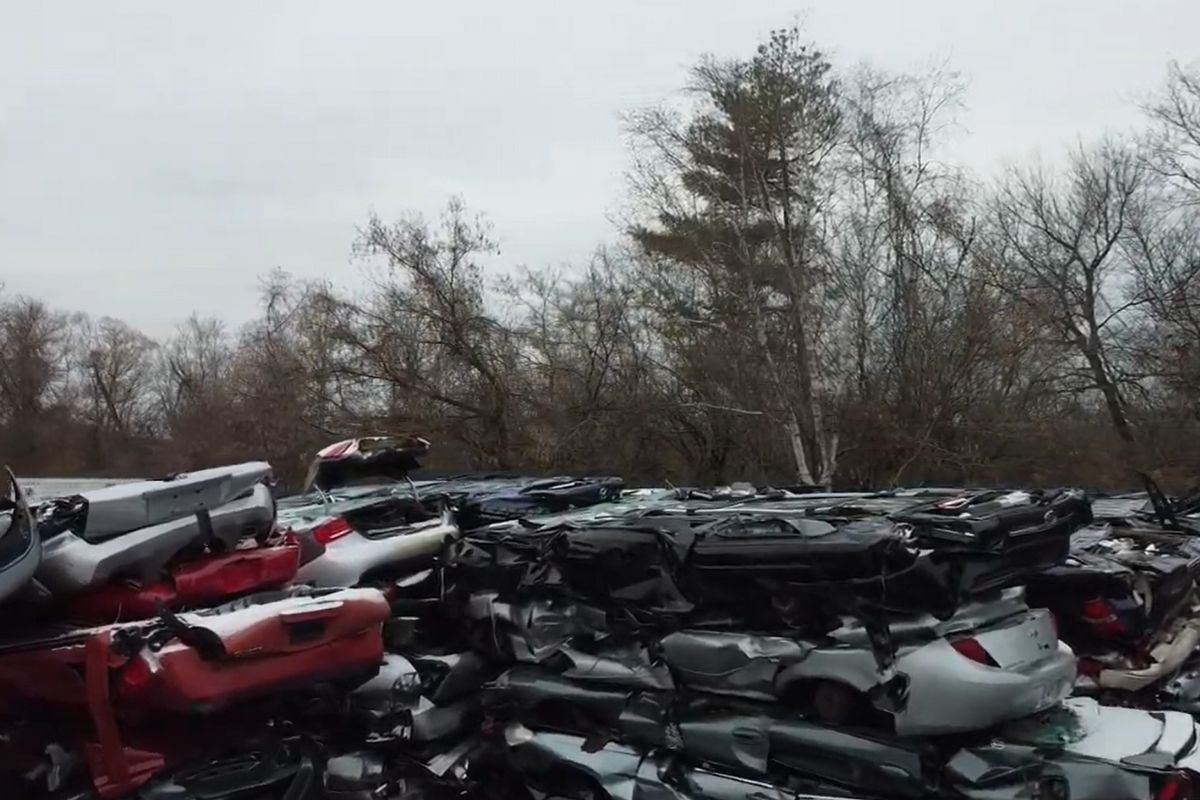 scrap car recycling – cars crushed in a scrap yard scrap car recycling - cars crushed in a scrap yard